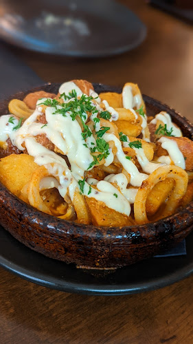 Opinii despre Momentos By The Lake Restaurant în Queenstown - Hospitality and gastronomy