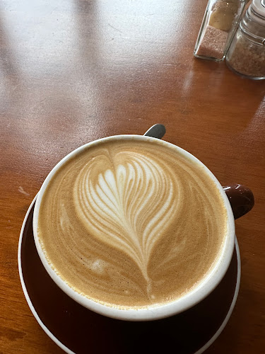 Hustl. Cafe Open Times