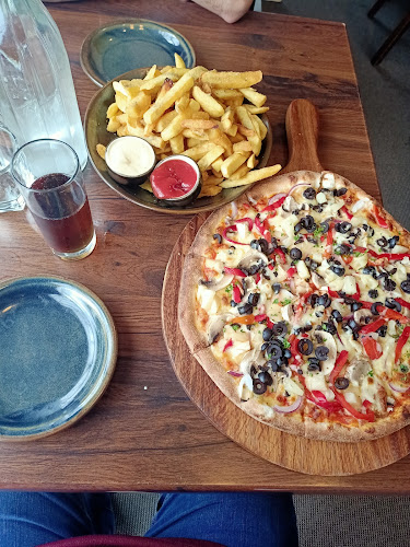 Scoozi Woodfire Pizza - Hospitality and gastronomy